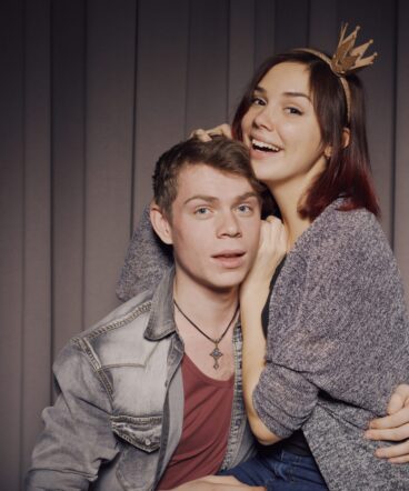 Happy couple in a photo booth